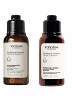 Two L'Occitane hair care bottles on a white background