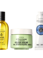 L'Occitane skincare products including a bottle, jar, and hand cream on a white background
